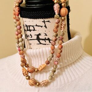 17" sandalwood or teak carved, beaded necklace, pastel & coral colors